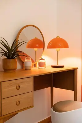 a desk with two lamps and a mirror on it at Retro-Modern Echoes in Athens