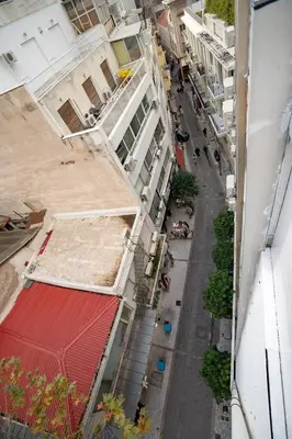 an overhead view of a city street with buildings at City Center Studio for 2 by MPS in Athens