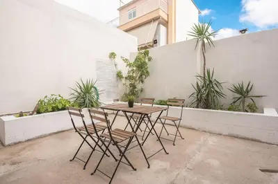 a table and chairs sitting on a patio at studio3 - -10-minutes-from-Monastiraki-Athens! in Athens