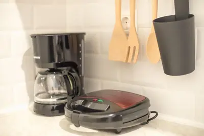 a kitchen counter with a toaster and a blender at studio3 - -10-minutes-from-Monastiraki-Athens! in Athens