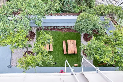 an overhead view of a garden with tables and trees at Dione Elegant Apartment Near Acropolis in Athens