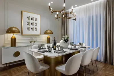 a dining room with a table and white chairs at 4bd Ensuite Luxury Residence Kolonaki in Athens