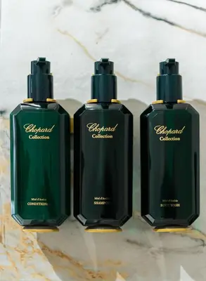 three bottles of soap sitting on top of a counter at 4bd Ensuite Luxury Residence Kolonaki in Athens