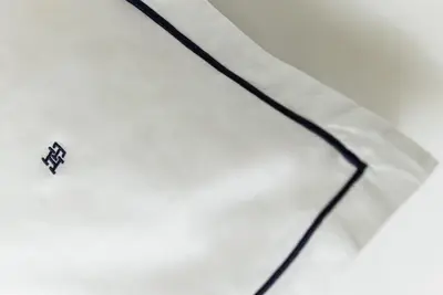 a close up of a white shirt with a tie at 4bd Ensuite Luxury Residence Kolonaki in Athens