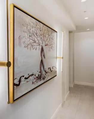 a painting of a tree hanging on a wall at 4bd Ensuite Luxury Residence Kolonaki in Athens