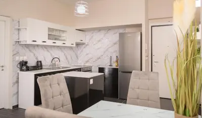 a kitchen with a sink and a counter at Luxury Athens Central in Athens