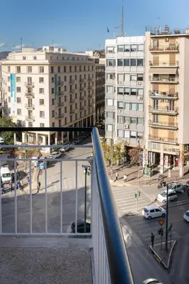 a view of a city with a street and buildings at Bivium Suites by LobbySquare in Athens