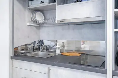 a kitchen with a sink and a counter top at Modern Gem in Central Athens in Athens