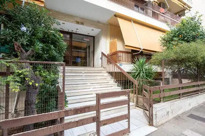 a set of stairs leading to a building at LIV - Spacious Flat for Friends & Family in Athens