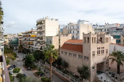a view of a city with tall buildings at LIV - Spacious Flat for Friends & Family in Athens