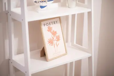 a shelf with a picture of a sign on it at Radiant Apt near Lycabettus in Athens