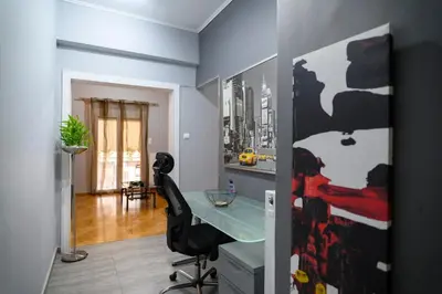 a home office with a desk and a chair at Cosy Pangrati Urban Retreat in Athens