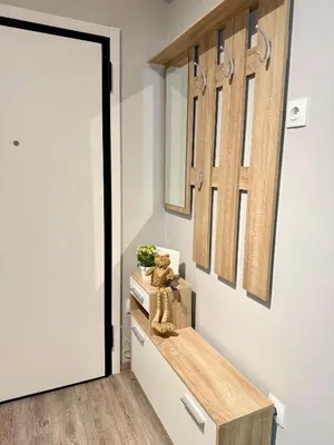 a hallway with a door leading into a room at Athens Platonos Appartment in Athens