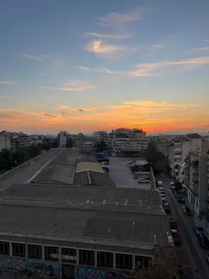 a rooftop view of a building with a parking lot at Lucas apartment 3 in Athens