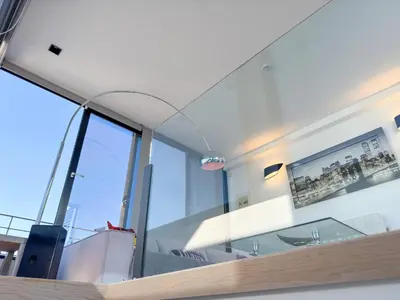 a room with glass walls and a large window at Luxury Loft with Private Jacuzzi in Athens