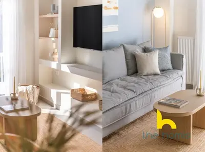 a living room with a couch and a table at Koukaki Elegance - Athenian Retreat near Acropolis in Athens