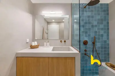 a bathroom with a sink and a shower at Koukaki Elegance - Athenian Retreat near Acropolis in Athens