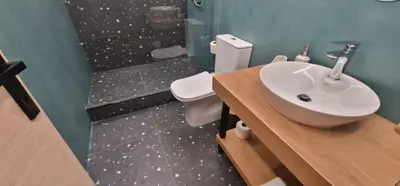 a bathroom with a sink and a toilet and a shower at New Ventiri Suite 6, near Hilton, Athens Central , 4 family & Bussines in Athens