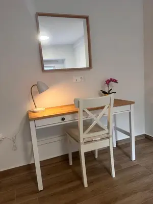 a desk with a chair and a mirror at A Lux, Athens center, Syntagma! Work or Play in Athens