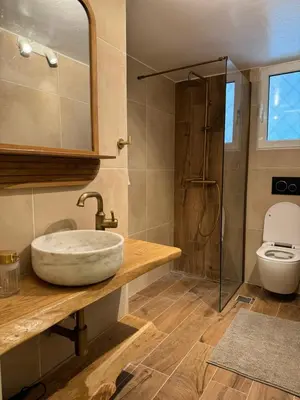 a bathroom with a sink and a toilet at Cozy apartment National Museum in Athens