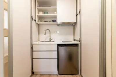 a small kitchen with a sink and a dishwasher at A36 Gateway to Plaka 400m 2 Syntagma Sunny patio in Athens