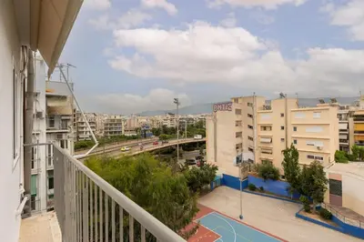 a balcony with a view of a city at Cozy Studio near the Acropolis in Athens