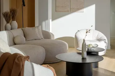 a living room with a couch and a table at Acropolis Penthouse Plunge Pool in Athens