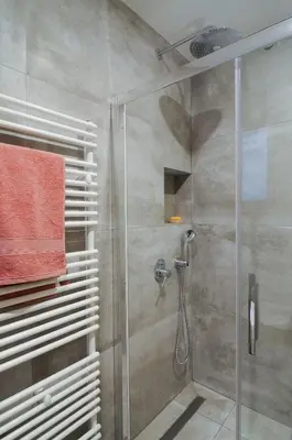 a bathroom with a shower with a glass door at Arditos Hill Residence in Athens