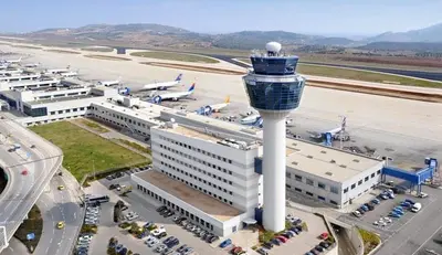 an airport with a control tower at an airport at Cozy House Oasis 15 min to airport & port, 35 min from Acropolis in Papangeláki
