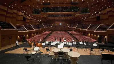 an empty auditorium with a concert in the middle at Luxury 3br Home at Hip Pangrati in Athens