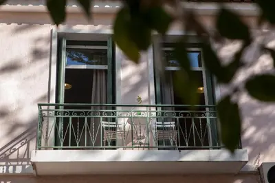 a balcony with a door and a window at Neoclassical with Jacuzzi near Acropolis-Living Stone Aragonit in Athens