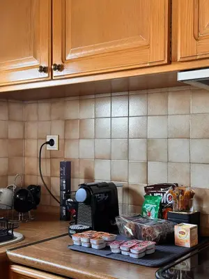 a kitchen with a counter with some food on it at Sea View apartment in Athens