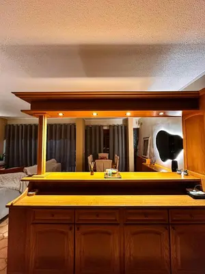 a kitchen with a yellow counter top in a room at Sea View apartment in Athens