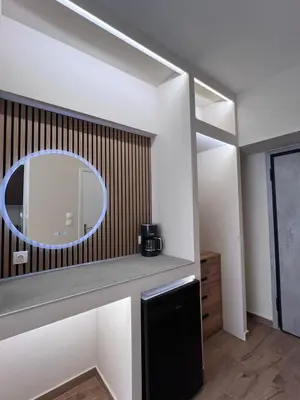 a bathroom with a mirror on the wall and a sink at Monastiraki 304 SuperHost Hub in Athens