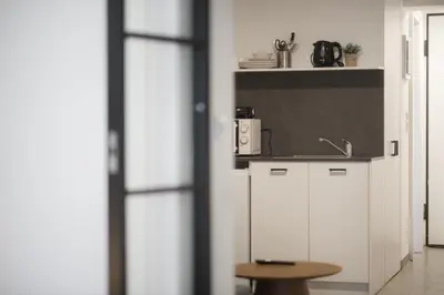 a kitchen with a sink and a counter top at Koukaki Urban Studio in Athens