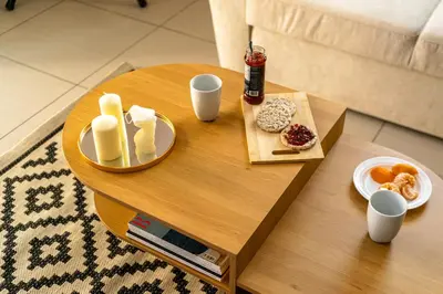 a coffee table with food and drinks on it at Entire Building for Big Groups in Athens in Athens