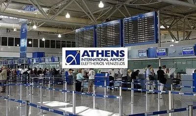 a group of people waiting in line at an airport at Argithea View in Papangeláki