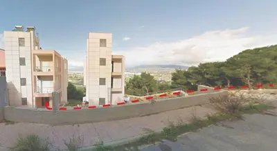 a rendering of a building with red barriers in front of it at Argithea View in Papangeláki