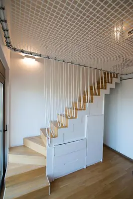 a staircase in a room with wooden floors at Amuse Athens Villa in Vari