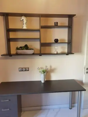 a desk in a room with shelves at 70m 2BR bright luxury apt in Athens