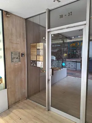 an entrance to a store with a sliding glass door at Kolonaki Prime Location Luxurius Flat in Athens