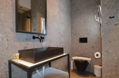 a bathroom with a sink and a mirror at Modern two bedroom apartment Stili Olympioy Dios in Athens