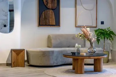 a living room with a couch and a table at Urban Serenity Suite in Athens in Athens