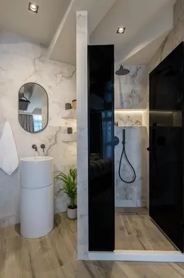 a bathroom with a sink and a shower at Urban Serenity Suite in Athens in Athens