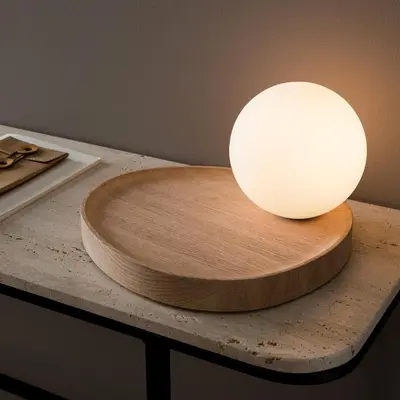 a table with a light on top of a table at New Delightful Apartment in Athens