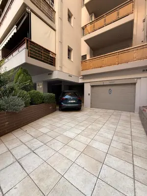 a car parked in the garage of a building at ArtemisAth in Athens