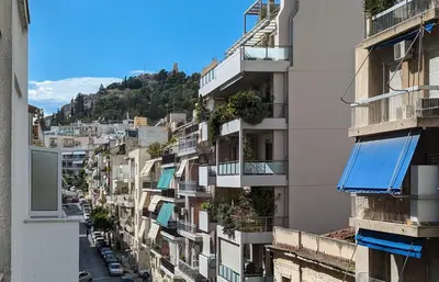arial view of an apartment building with balconies at Chessboard styled 2BD apt next to Acropolis&Metro in Athens