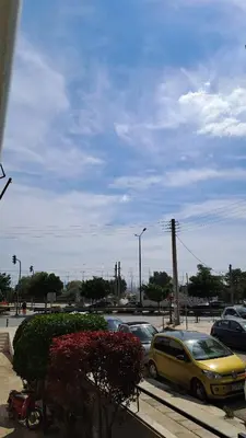 a group of cars parked in a parking lot at Athens Riviera Bee Home Appartments in Athens
