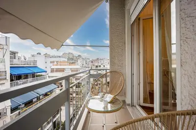 a balcony with chairs and a view of a city at Cozy Apartment - Best Location in Athens in Athens