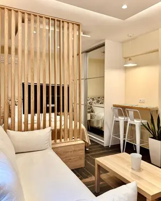 a living room with a bed and a table at Ermou 18 Central Cozy Apartment in Athens